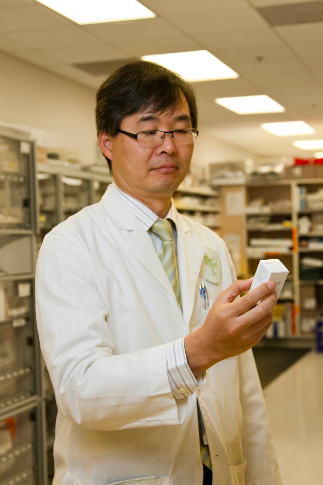 Nates Supply Inc team member reviewing medical supply inventory